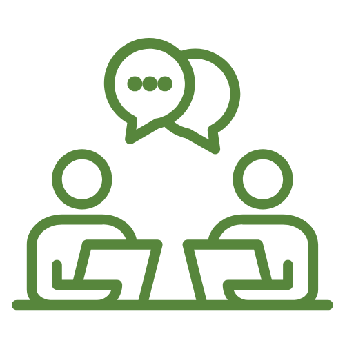 Green outline icon depicting two figures sitting at a table using laptops with overlapping speech bubbles overhead.